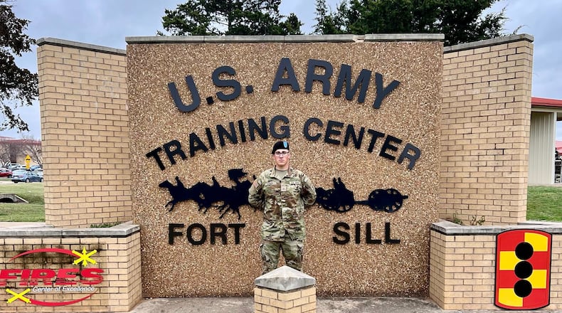 This photo provided by Andrew Coady shows his son, Declan Coady, posing for a photo on the day of his graduation at U.S. Army Training Center at Fort Sill, Okla., March 15, 2024. (Andrew Coady via AP)