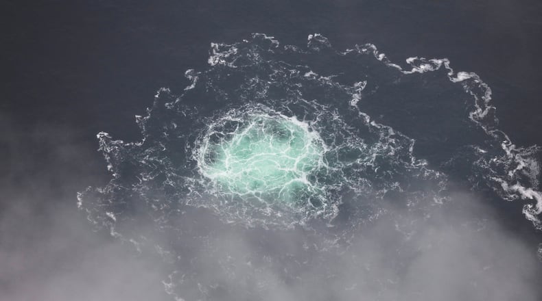 FILE - This photo provided by Swedish Coast Guard shows a leak from Nord Stream 2 on Sept. 28, 2022. (Swedish Coast Guard via AP, File)
