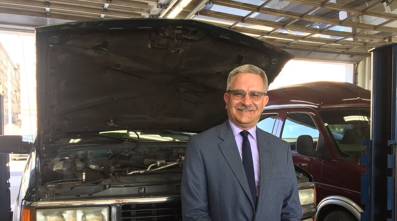 CUTLINE: Bob Kazmierczak, director of automotive products and service development at AAA Club Alliance, predicts fully automated vehicles may be on America s streets and roadways by 2024, and wants people to be unafraid of the many changes such technology will bring to various facets of society, he said Aug. 9 while making a stop at AAA Tire and Auto, 200 E. Third St., Dayton. AMY ROLLINS / STAFF