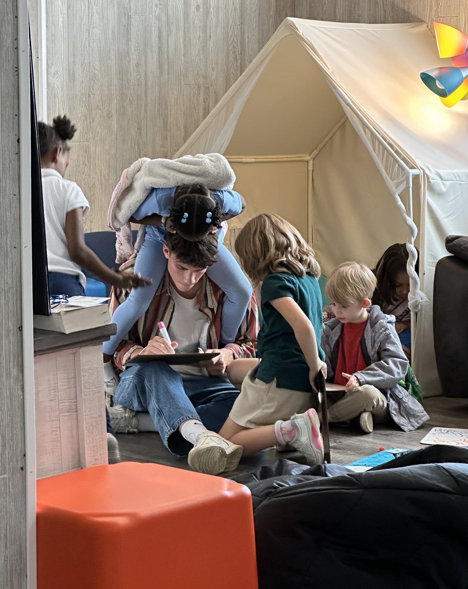 A Cedarville student enjoys playing with the elementary-aged students at the Ark of H.O.P.E. CEDARVILLE UNIVERSITY / CONTRIBUTED
