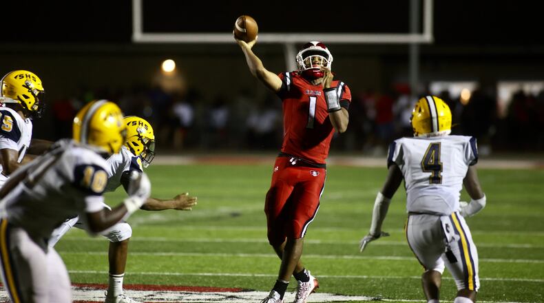 Trotwood-Madison's Timothy Carpenter throws against Springfield on Friday, Sept. 1, 2023, in Trotwood. David Jablonski/Staff