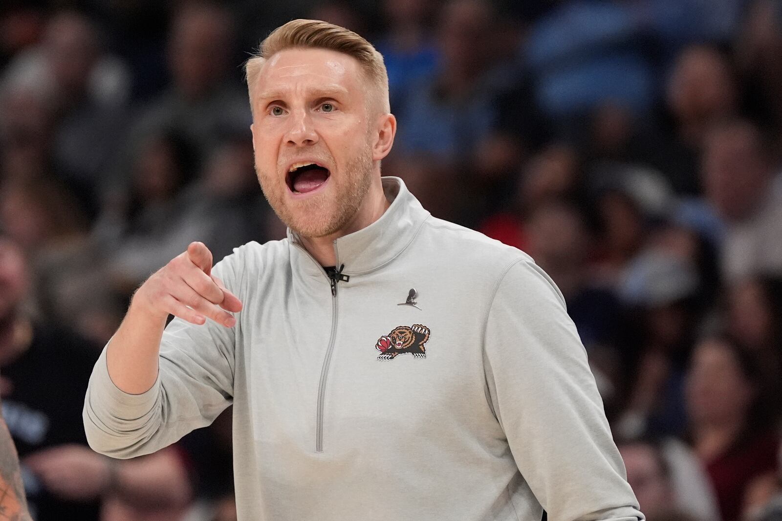 Memphis Grizzlies interim head coach Tuomas Iisalo yells during the second half of an NBA play-in tournament basketball game against the Dallas Mavericks, Friday, April 18, 2025, in Memphis, Tenn. (AP Photo/George Walker IV)