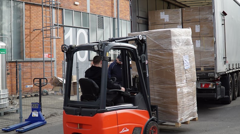 A man packs medical supplies for people in Ukraine into a truck. Photo provided by Mercy Health.