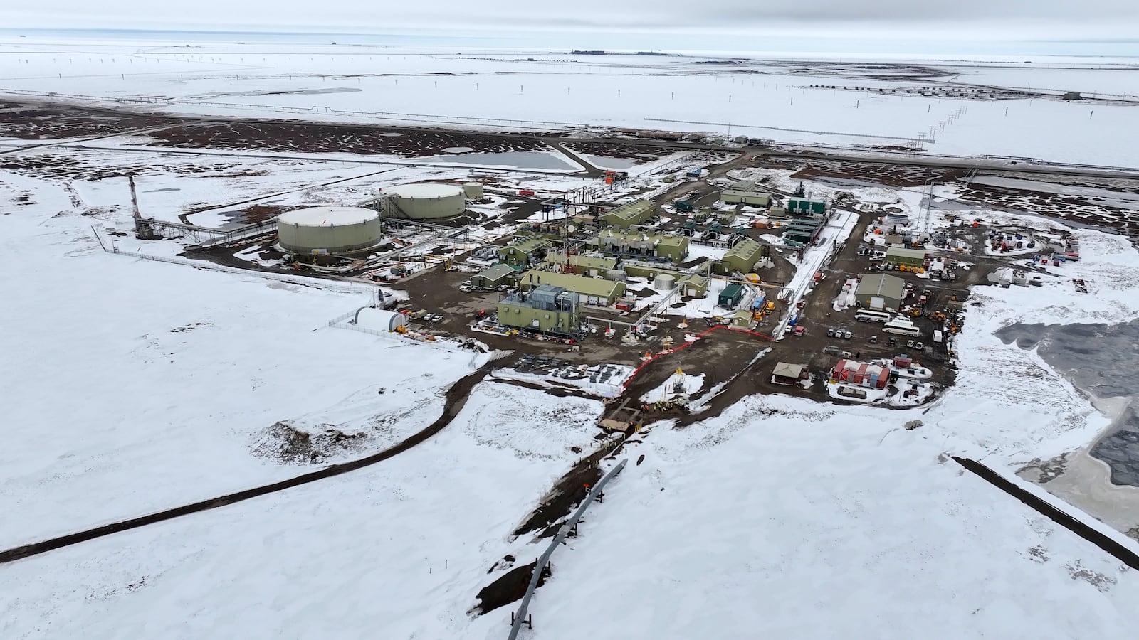Pump Station 1 is seen on Monday, June 2, 2025, located near Deadhorse, Alaska, on the state's prodigious North Slope, with the start of the Trans-Alaska Pipeline at bottom center. (AP Photo/Jenny Kane)