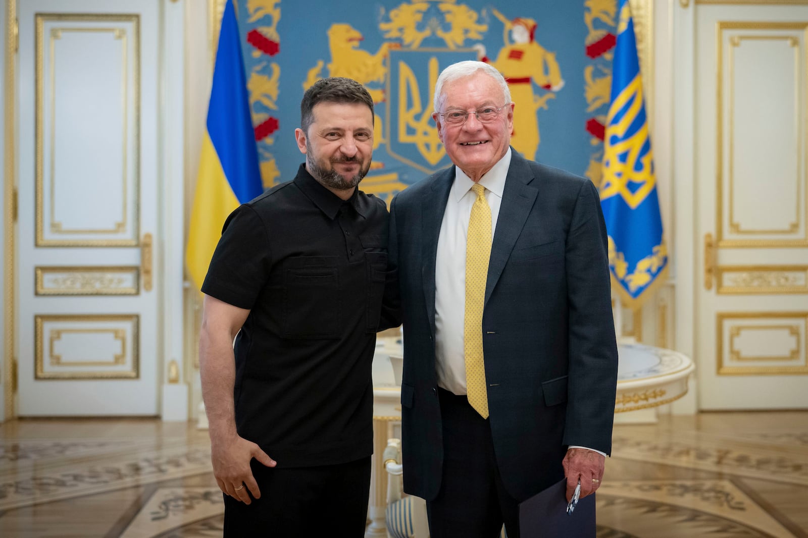 Ukrainian President Volodymyr Zelenskyy, left, and United States Special Envoy for Ukraine and Russia, Joseph Keith Kellogg pose for a photo in Kyiv, Ukraine, Monday, July 14, 2025. (Ukrainian Presidential Press Office via AP)