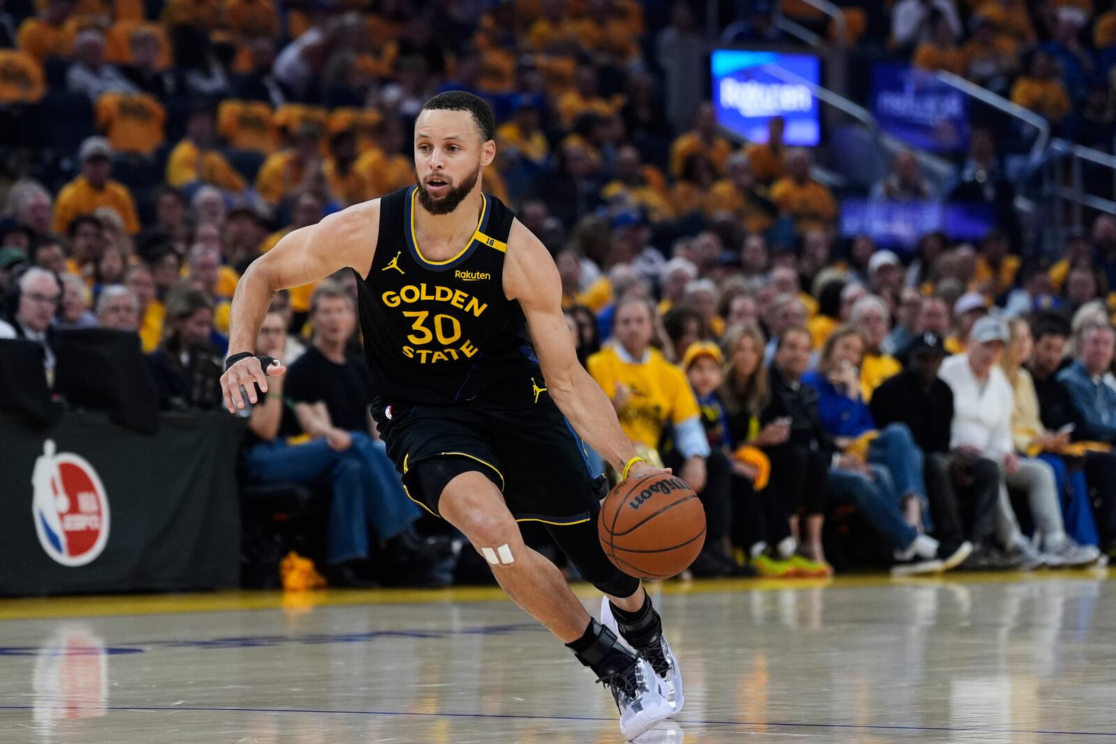 Golden State Warriors guard Stephen Curry moves the ball during the first half of Game 6 of an NBA basketball first-round playoff series against the Houston Rockets, Friday, May 2, 2025, in San Francisco. (AP Photo/Godofredo A. Vásquez)
