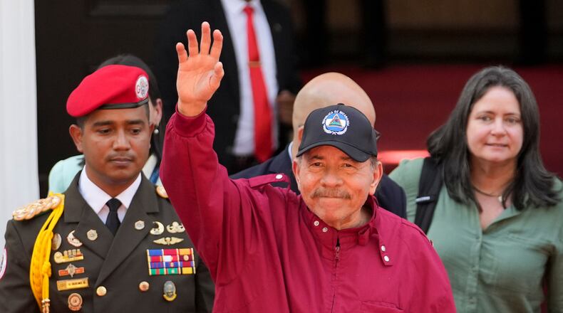 FILE - Nicaragua's President Daniel Ortega waves after attending the swearing-in ceremony of Venezuela's President Nicolas Maduro for a third term at the National Assembly in Caracas, Friday, Jan. 10, 2025. (AP Photo/Matias Delacroix, File)