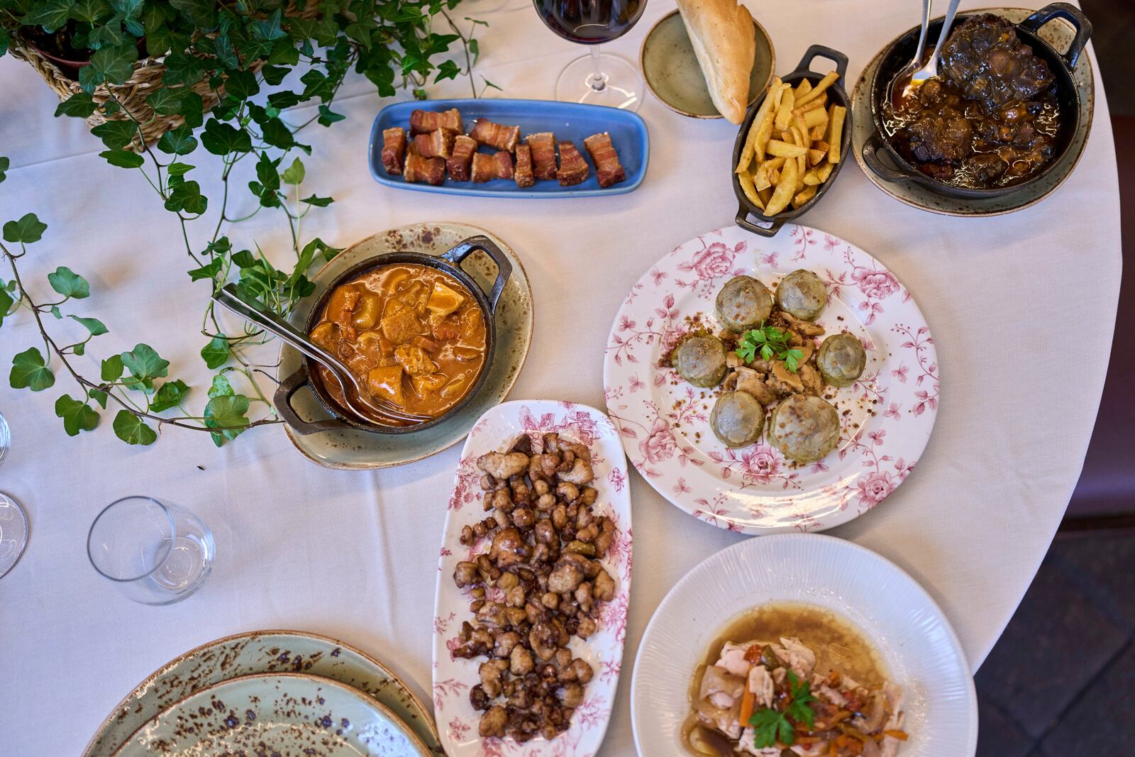 Several dishes from the restaurant's menu are photographed at Casa Pedro restaurant in Madrid, Spain, on May 16, 2025. (AP Photo/Manu Fernandez)