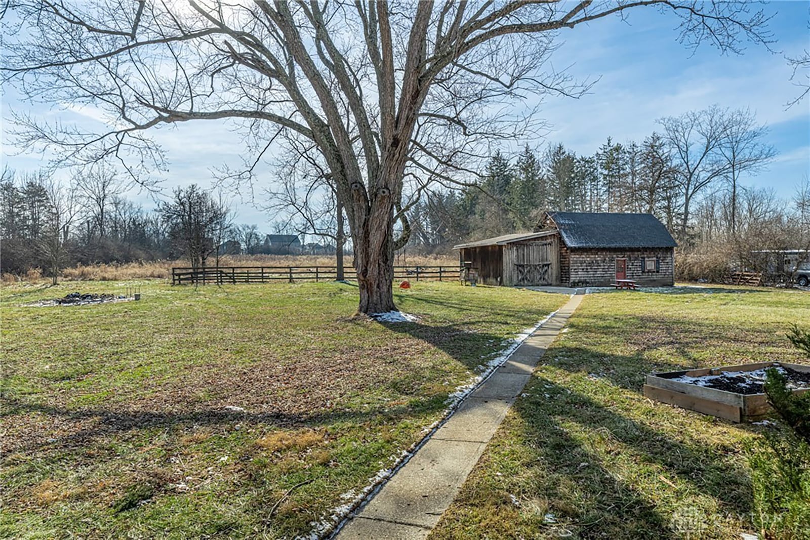 The barn on the property has electricity and a workshop area. There is also a partially fenced pasture. CONTRIBUTED