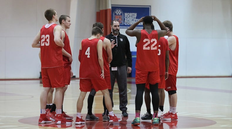 Wittenberg’s Matt Croci talks to the players during practice on Monday, Jan. 15, 2018, at Pam Evans Smith Arena in Springfield. David Jablonski/Staff