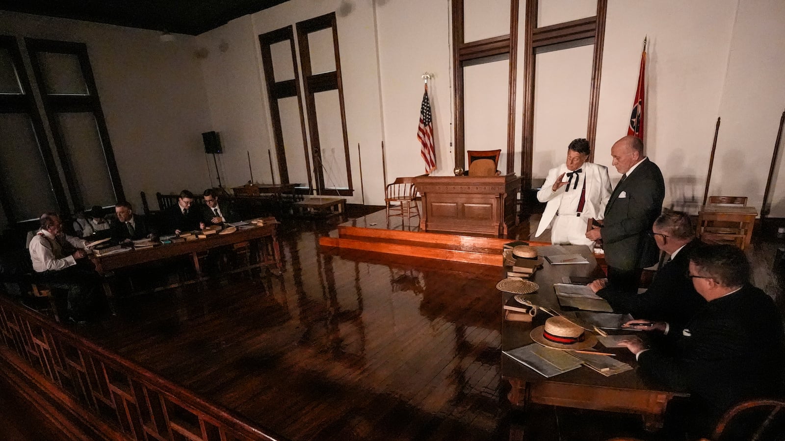 Larry Jones, who portrays William Jennings Bryan, in white suit, rehearses with other actors in the play "Destiny in Dayton", July 8, 2025, in Dayton, Tenn. (AP Photo/Mike Stewart)