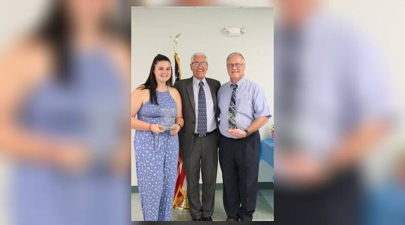 Young Citizen of the Year Makenzie Gossett, Enon Mayor Tim Howard, and Citizen of the Year Elmer Beard holding their etched glass awards. Submitted