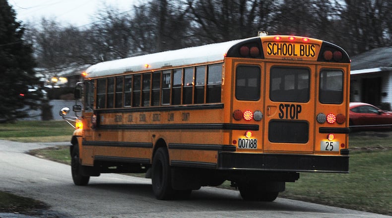 A Greenon school bus runs its route Friday Dec. 16, 2022. MARSHALL GORBY\STAFF