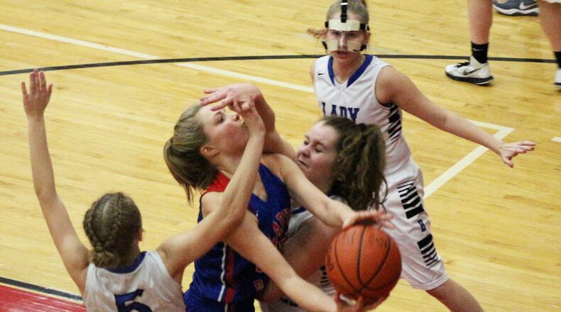 Greeneview sophomore Sylvie Sonneman drives to the basket during the Division III sectional at Trotwood-Madison High School on Wednesday. GREG BILLING / CONTRIBUTED