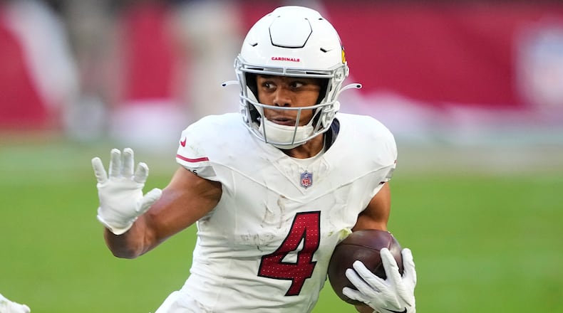 FILE - Arizona Cardinals wide receiver Rondale Moore (4) runs against the San Francisco 49ers during the first half of an NFL football game, Dec. 17, 2023, in Glendale, Ariz. (AP Photo/Matt York, File)