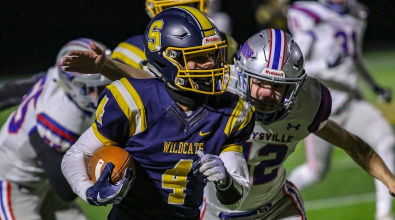 Springfield High School wide receiver James Wood II runs the ball during their Division I, Region 2 quarterfinal game against Marysville on Friday night at Springfield High School. The Wildcats on 23-0. CONTRIBUTED PHOTO BY MICHAEL COOPER
