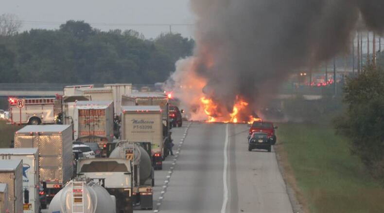 Pictured is a crash on Interstate 70 that killed a driver Thursday morning. Three separate crashes, all involving vehicles that caught fire, resulted in two deaths. STAFF/BILL LACKEY