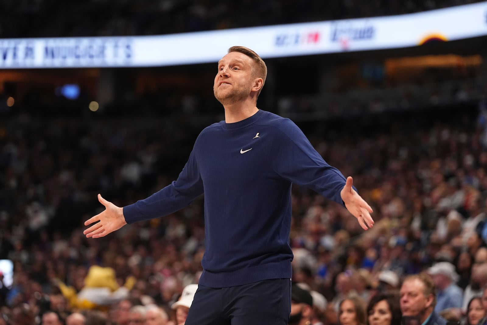 Memphis Grizzlies interim head coach Tuomas Lisalo directs his team against the Denver Nuggets in the first half of an NBA basketball game Friday, April 11, 2025, in Denver. (AP Photo/David Zalubowski)
