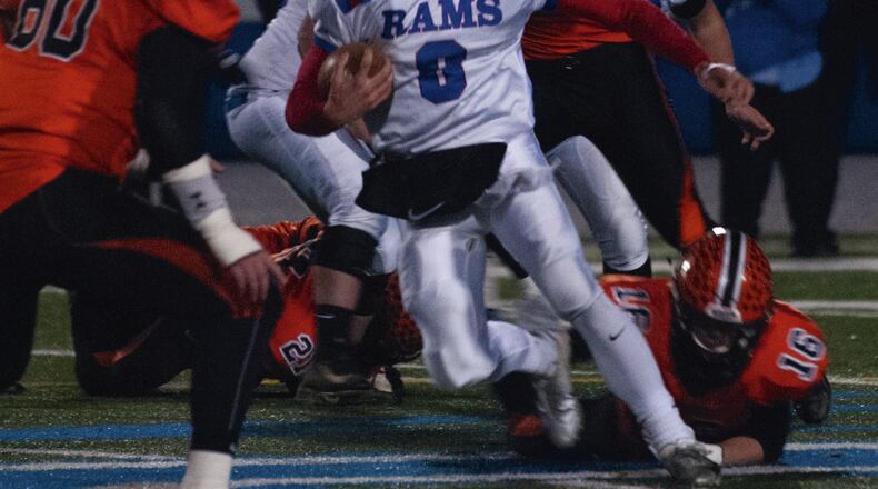 Greeneview quarterback Nick Clevenger runs for yardage in the first half of Saturday night’s Division V Region 20 game against Wheelersburg in Chillicothe. Jeff Gilbert/CONTRIBUTED