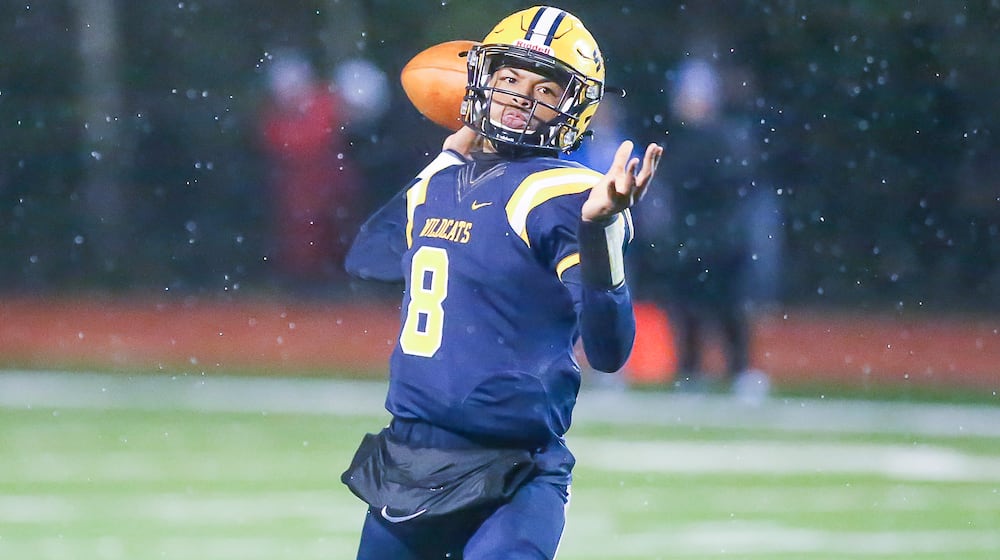 Springfield's Te'Sean Smoot throws a pass against Findlay in a Division I, Region 2 semifinal on Friday, Nov. 12, 2021. MICHAEL COOPER / CONTRIBUTED PHOTO