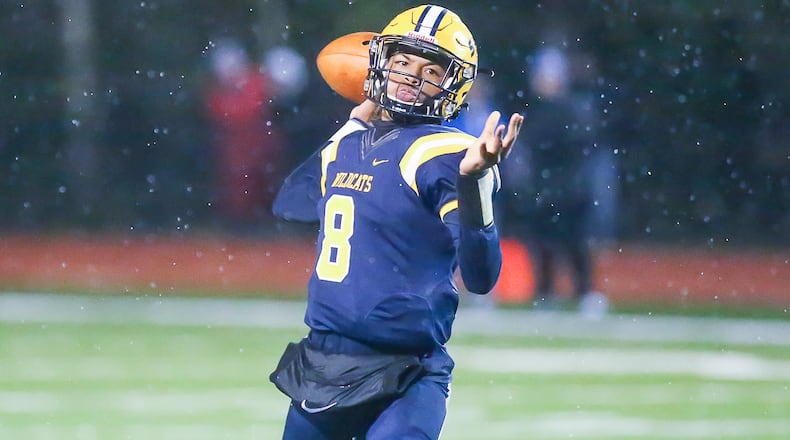 Springfield's Te'Sean Smoot throws a pass against Findlay in a Division I, Region 2 semifinal on Friday, Nov. 12, 2021. MICHAEL COOPER / CONTRIBUTED PHOTO