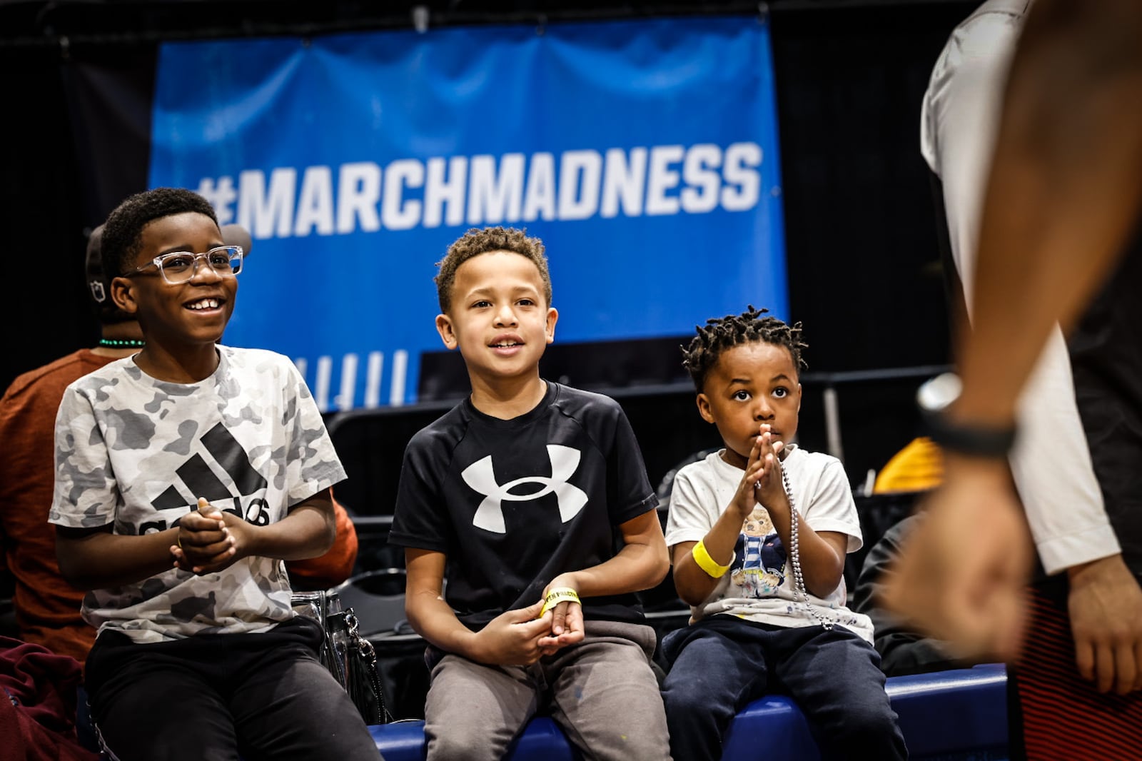 From left, Cameron Reynolds, Kaden Pickens and Jayce Pickens watch Southeast Missouri practice at the First Four. Jim Noelker/Staff