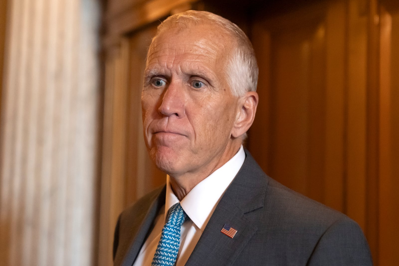 Sen. Thomas Tillis, R-N.C., speaks to reporters as Republicans begin a final push to advance President Donald Trump's tax breaks and spending cuts package, at the Capitol in Washington, Monday, June 30, 2025. (AP Photo/Mark Schiefelbein)