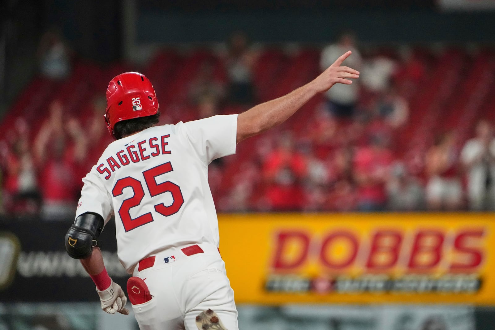 St. Louis Cardinals' Thomas Saggese celebrates as he rounds the bases after hitting a two-run home run during the third inning of a baseball game against the Cincinnati Reds Tuesday, Sept. 16, 2025, in St. Louis. (AP Photo/Jeff Roberson)