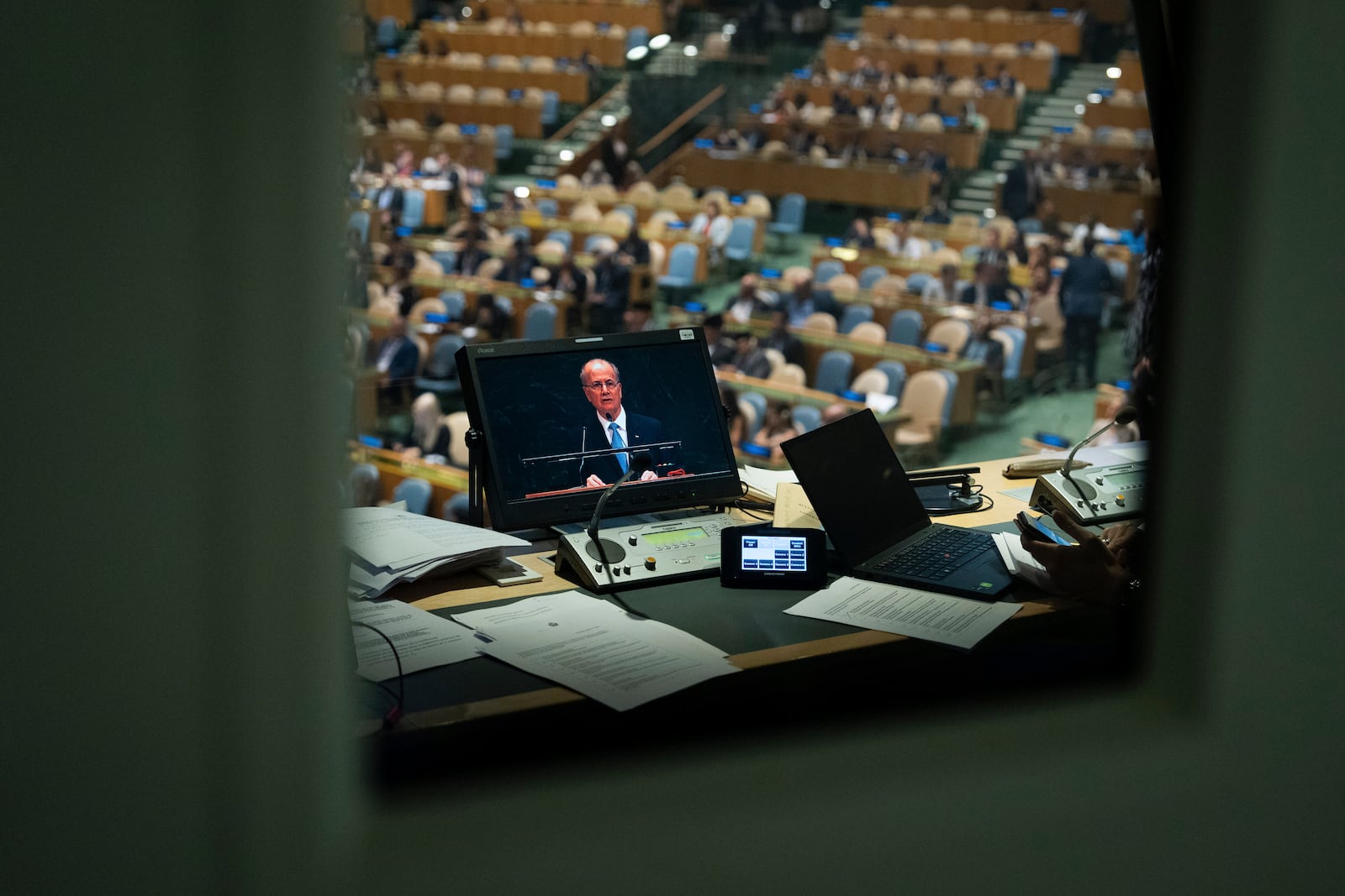 Palestinian Prime Minister Mohammed Mustafa is seen on a interpreter monitor as he speaks during a high-level International Conference for the Peaceful Settlement of the Question of Palestine and the Implementation of the Two-State solution at United Nations Headquarters, Monday, July 28, 2025. (AP Photo/Adam Gray)