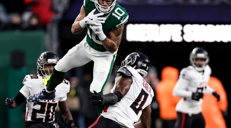 New York Jets wide receiver Allen Lazard (10) makes a catch against Atlanta Falcons during the second half of an NFL football game, Sunday, Nov. 30, 2025, in East Rutherford, N.J. (AP Photo/Adam Hunger)