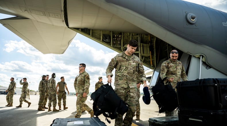 Airmen from the 88th Operations Support Squadron at Wright-Patterson Air Force Base, Ohio, provides support to 1st Special Operations Wing as they arrive Sept. 27, 2022, from Hurlburt Field, Florida. Aircraft, equipment and Airmen evacuate to find safety from Hurricane Ian. (U.S. Air Force photo by Hannah Carranza)