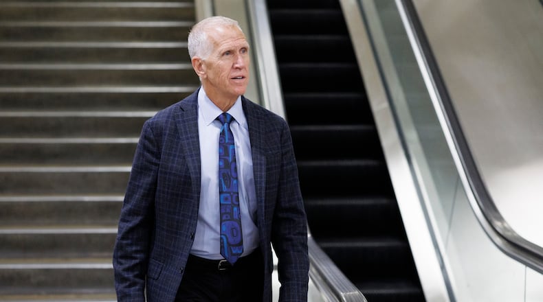 Sen. Thom Tillis, R-N.C., descends an stairwell after a vote at the Capitol, Friday, March 20, 2026, in Washington. (AP Photo/Tom Brenner)