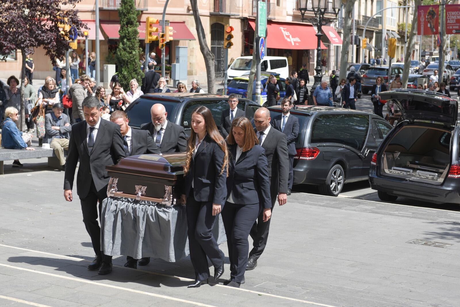 Members of the funeral home carry the body of one of those killed in a helicopter crash two weeks ago in New York, during a funeral in Barcelona, Spain on Tuesday, April 22, 2025. (Alberto Paredes/Europa Press via AP)