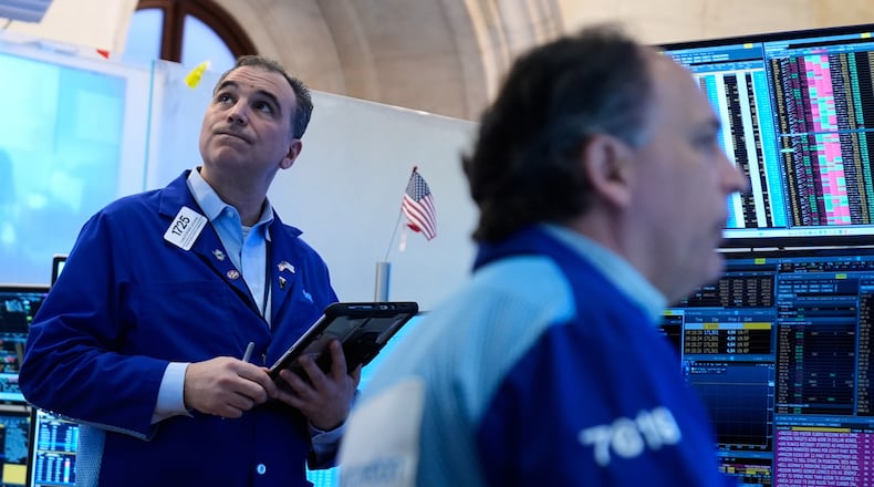 Christopher Lagana works on the floor at the New York Stock Exchange in New York, Tuesday, March 10, 2026. (AP Photo/Seth Wenig)