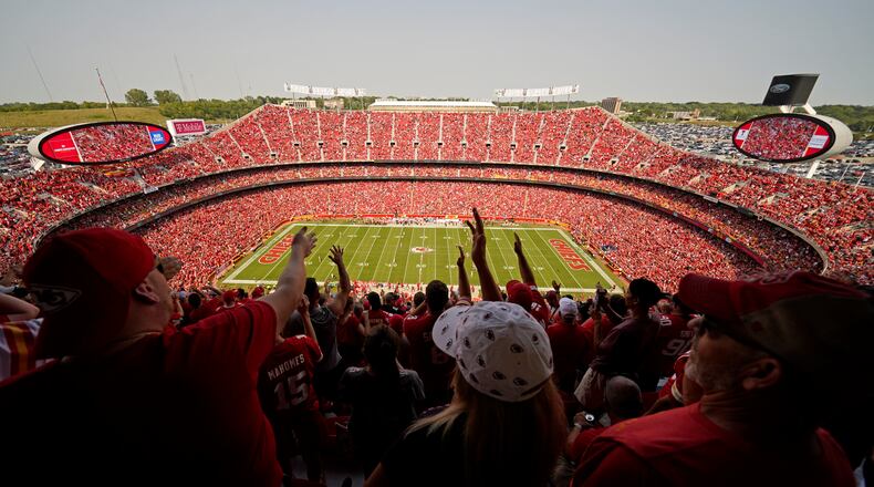 Fans do the tomahawk chop as the Kansas City Chiefs and the Cleveland Browns play during the first half of an NFL football game at Arrowhead Stadium, Sunday, Sept. 12, 2021, in Kansas City, Mo. (AP Photo/Charlie Riedel)
