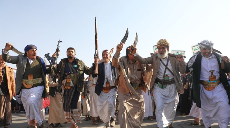 Houthi supporters dance as they celebrate following the announcement that Israel and Hamas have agreed to the first phase of a peace plan to pause the fighting, in Sanaa, Yemen, Friday, Oct. 10, 2025. (AP Photo/Osamah Abdulrahman)