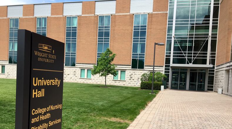 Administrators work at University Hall at Wright State University. LYNN HULSEY/STAFF