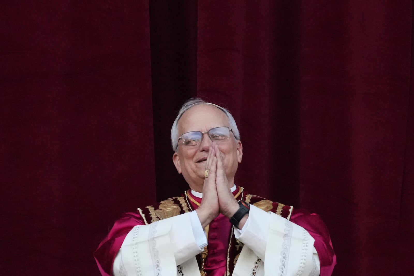 Newly elected Pope Leo XIV appears at the balcony of St. Peter's Basilica at the Vatican, Thursday, May 8, 2025. (AP Photo/Alessandra Tarantino)