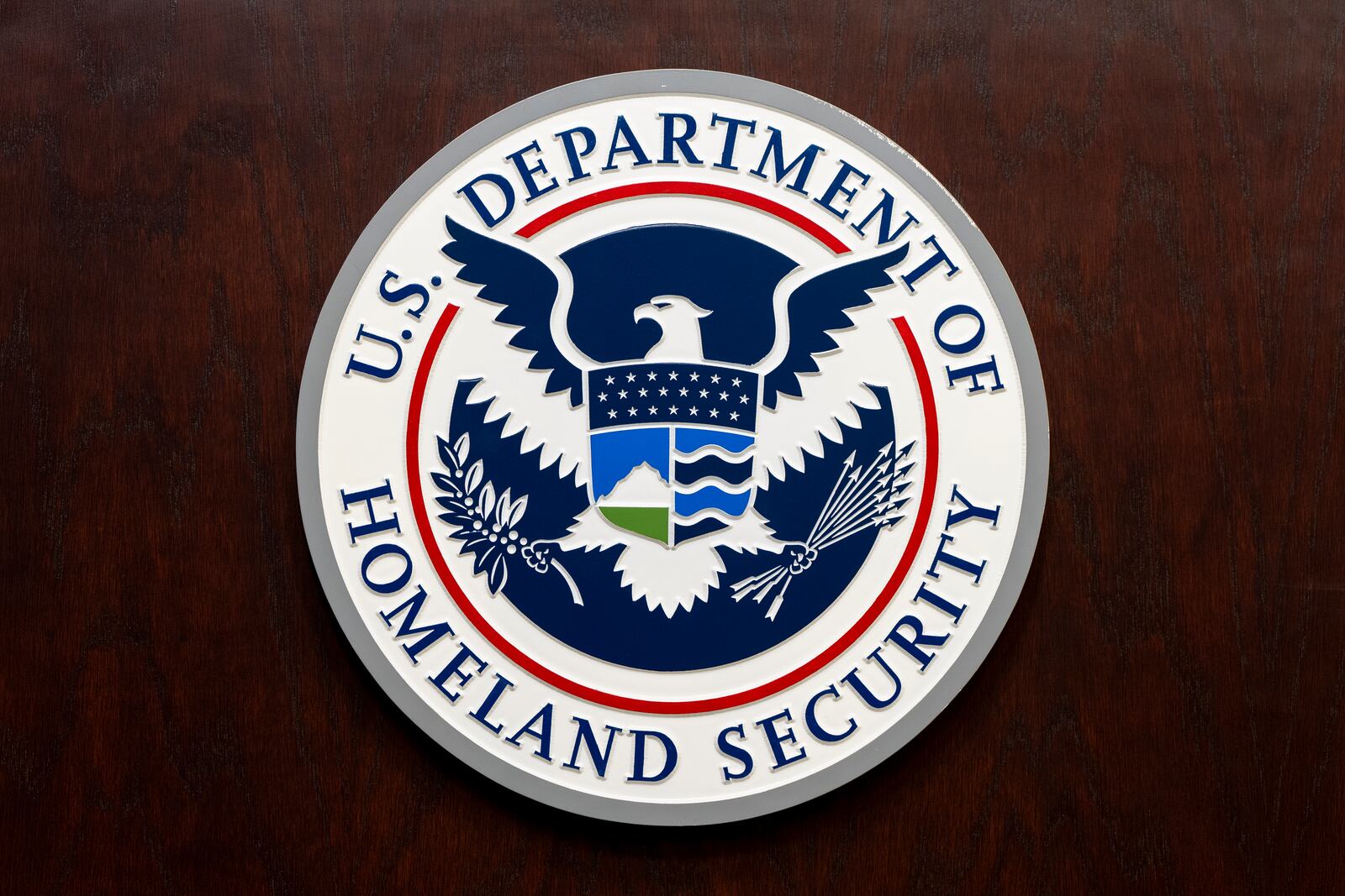 The Department of Homeland Security seal is seen on the podium at the Immigration and Customs Enforcement headquarters, Wednesday, April 9, 2025, in Washington. (AP Photo/Alex Brandon)