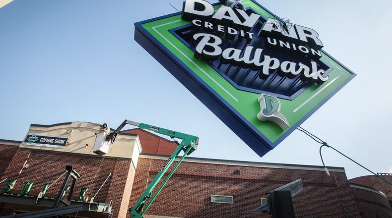 The new Day Air signs are going up around the ballpark Monday Nov. 23, 2020. The Day Air signs will replace the Fifth Third signs and this sign at the entrance is one of many signs going up in the near future.