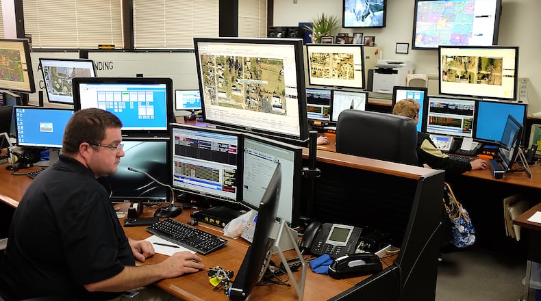A photo of inside the dispatch center in the Clark County Sheriff’s Office in 2017. The county is opening a new dispatch center that will provide services to most of Clark County's residents, including Springfield. Bill Lackey/Staff