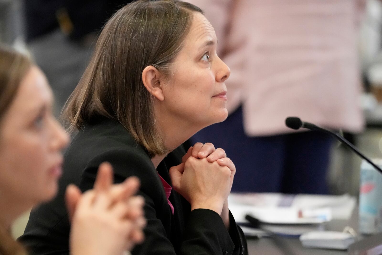 Maine's Secretary of State, Shenna Bellows, listens during the U.S. Election Assistance Commission Standards Board in-person public meeting, Thursday, April 24, 2025, in Charlotte, N.C. (AP Photo/Chris Carlson)