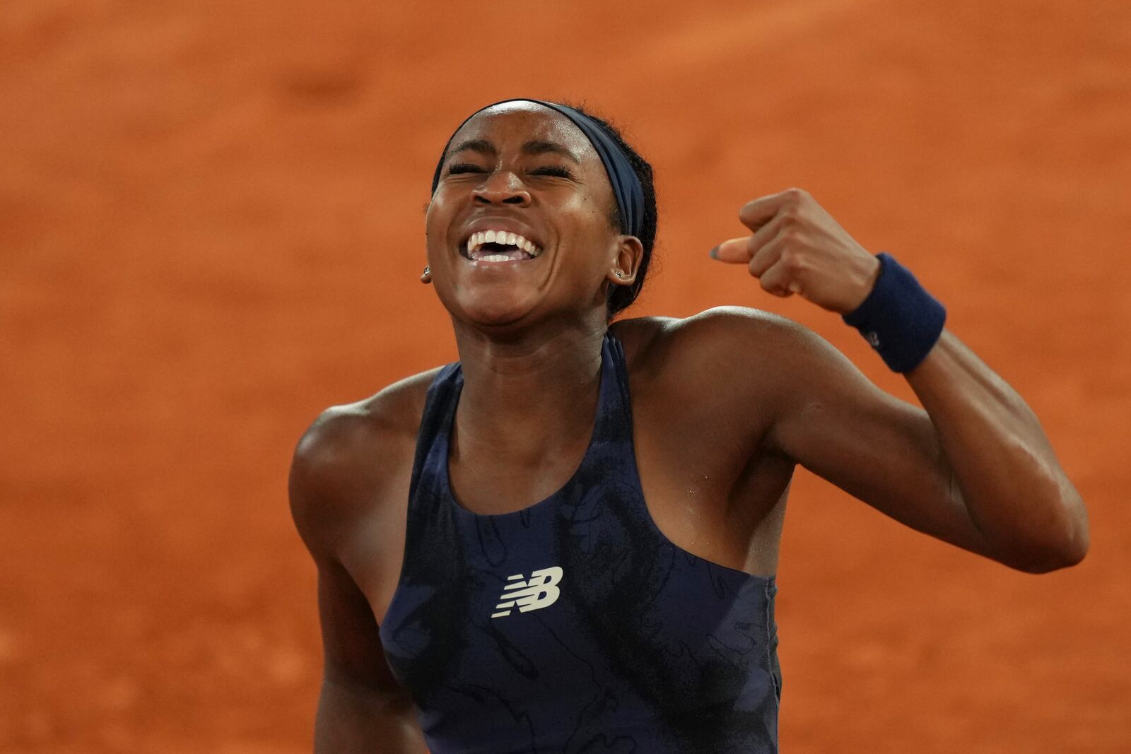 Coco Gauff of the U.S. celebrates as she won the semifinal match of the French Tennis Open against France's Lois Boisson at the Roland-Garros stadium in Paris, Thursday, June 5, 2025. (AP Photo/Aurelien Morissard)