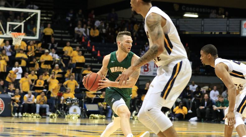 Wright State’s Bill Wampler, shown here earlier this season vs. Murray State, scored 17 points Tuesday night in the Raiders’ 77-59 loss to Penn State in Cancun, Mexico. CONTRIBUTED