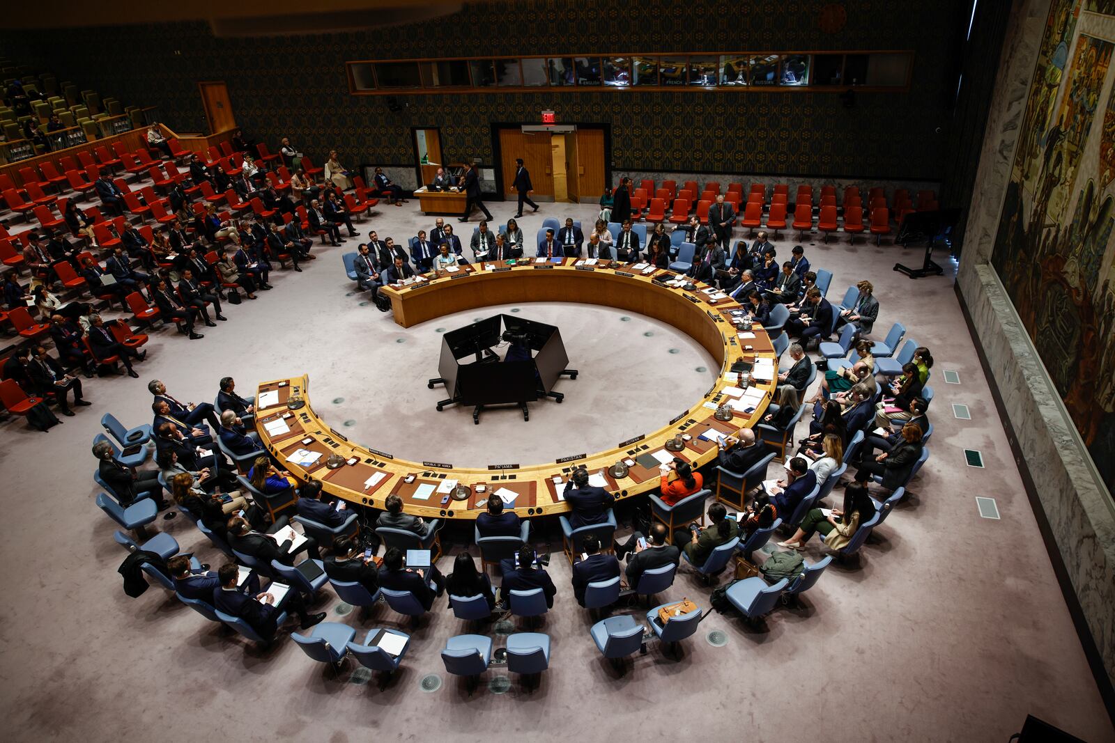 Syria's Foreign Minister Asaad Al-Shibani, left, speaks as he attends a Security Council meeting on the situation of the Middle East at United Nations Headquarters on Friday, April 25, 2025. (AP Photo/Kena Betancur)