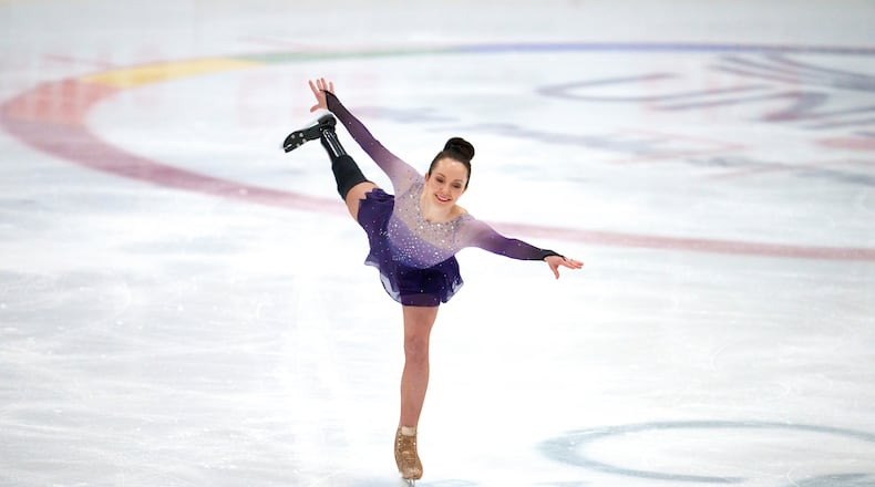 Stef Reid, a former Paralympic athlete who now does figure skating, competes in the British Adult Figure Skating Championships in Sheffield, England, Friday, Feb. 6, 2026. (AP Photo/Jon Super)