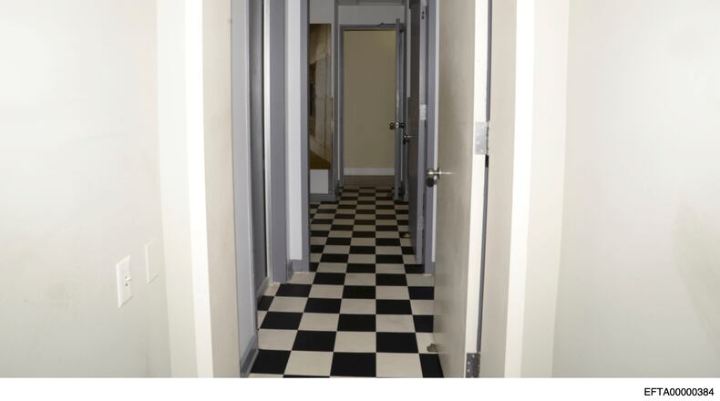 This photo released by the U.S. Department of Justice shows a hallway during a search of Jeffrey Epstein's home on July 6, 2019, in New York. (U.S. Department of Justice via AP)