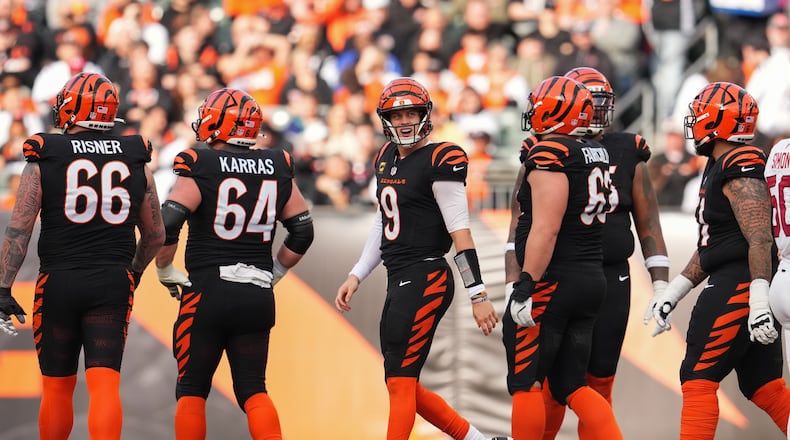 Cincinnati Bengals quarterback Joe Burrow (9) reacts during the first half of an NFL football game against the Arizona Cardinals, Sunday, Dec. 28, 2025, in Cincinnati. (AP Photo/Jeff Dean)