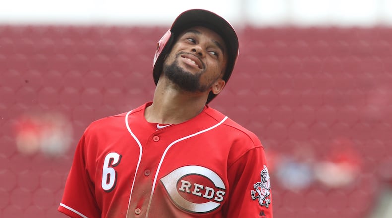 The Reds' Billy Hamilton smiles during a game back to the Brewers on Sunday, April 16, 2017, at Great American Ball Park in Cincinnati.
