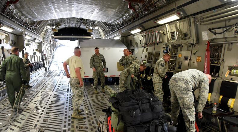 A six person team from the 269th Combat Communications Squadron, Ohio Air National Guard board a C-17 Globemaster III as they prepare to fly to St. Thomas, U.S. Virgin Island in support of Hurricane Irma relief efforts Sept. 7. The 269 CBCS provides tactical communication support to those involved in the hurricane relief efforts. Contributed photo